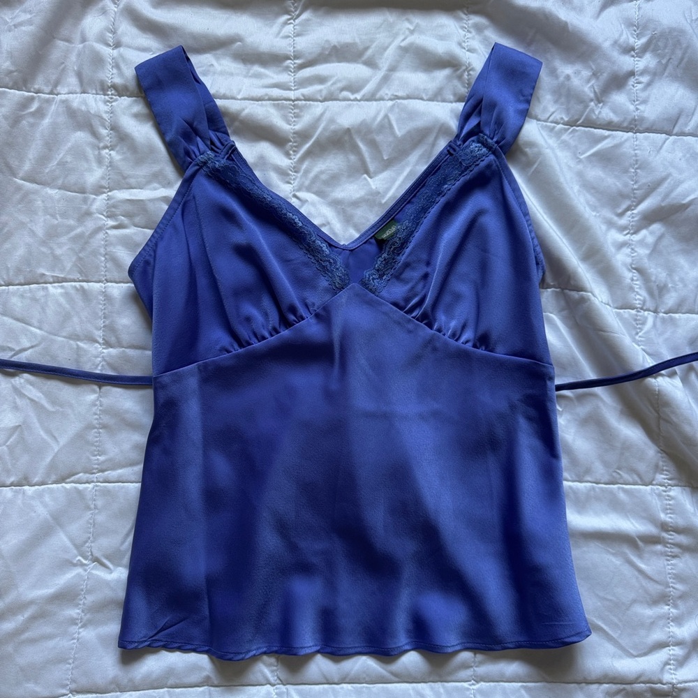 Classic silky blouse. It appears to be blue but it’s purple.
